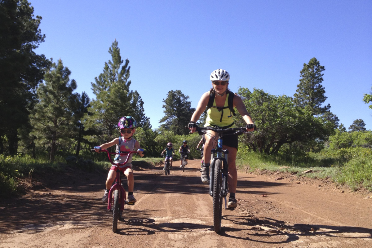 Mother and daughter riding bikes